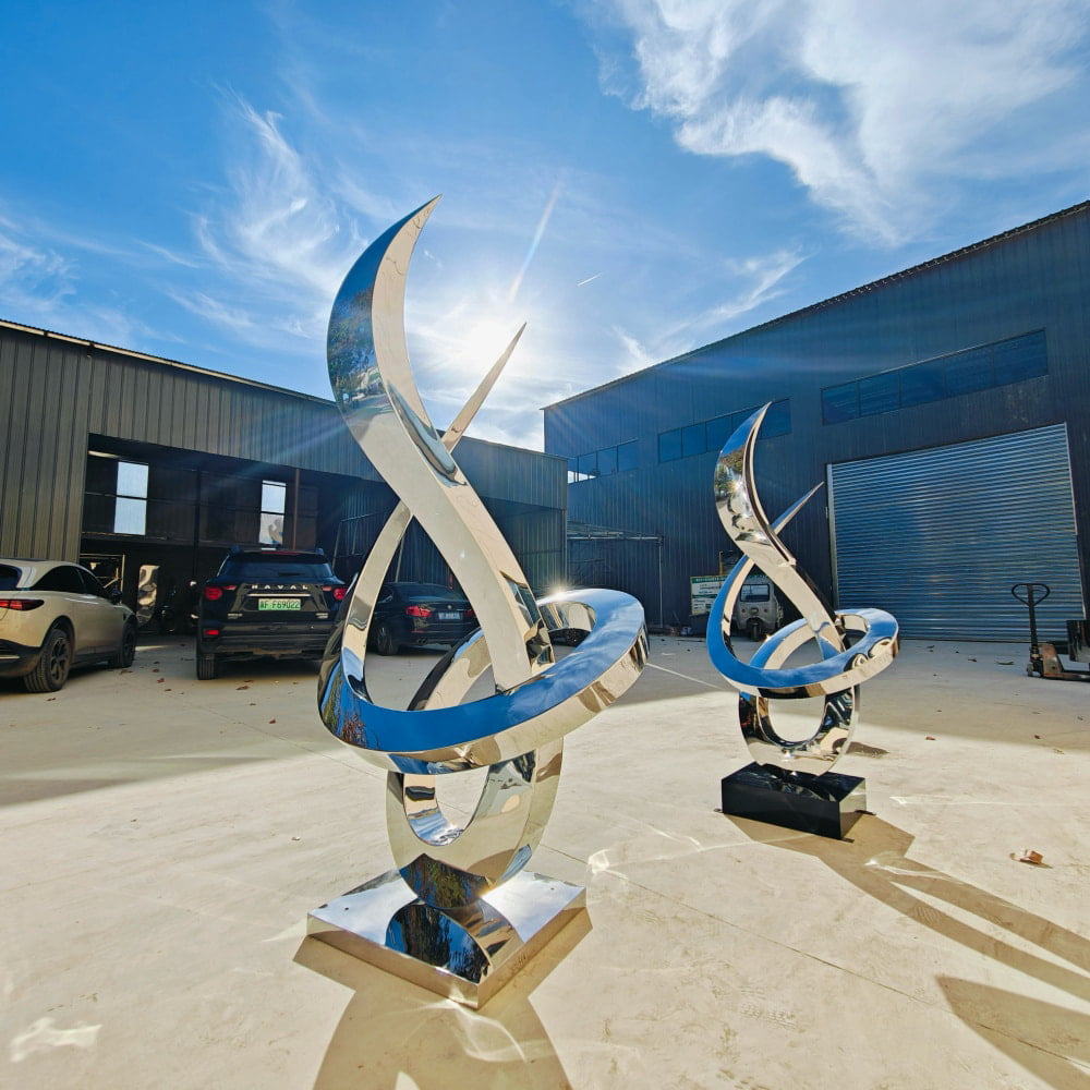 Two Spiral Flame Abstract Sculptures