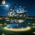 Mirror Polished Golf Ball Sculpture at Night
