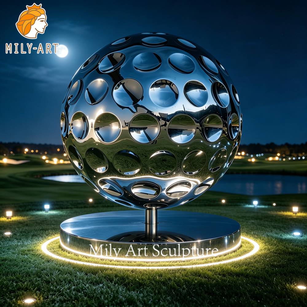 Mirror Polished Golf Ball Sculpture at Night