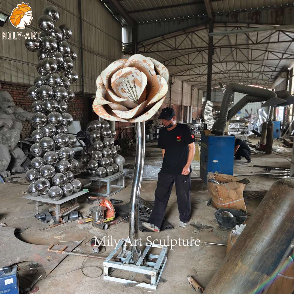 Welded metal rose sculpture