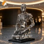 abstract kneeling woman sculpture