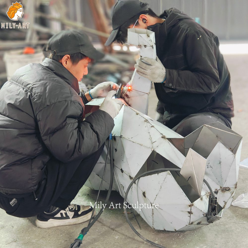 geometric lion sculpture welding