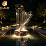 harp water fountain illuminated at night