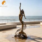 metal mermaid sculpture front view outdoor