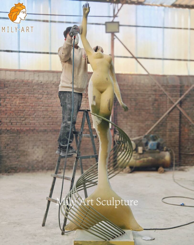 metal mermaid sculpture grinding and smoothing process