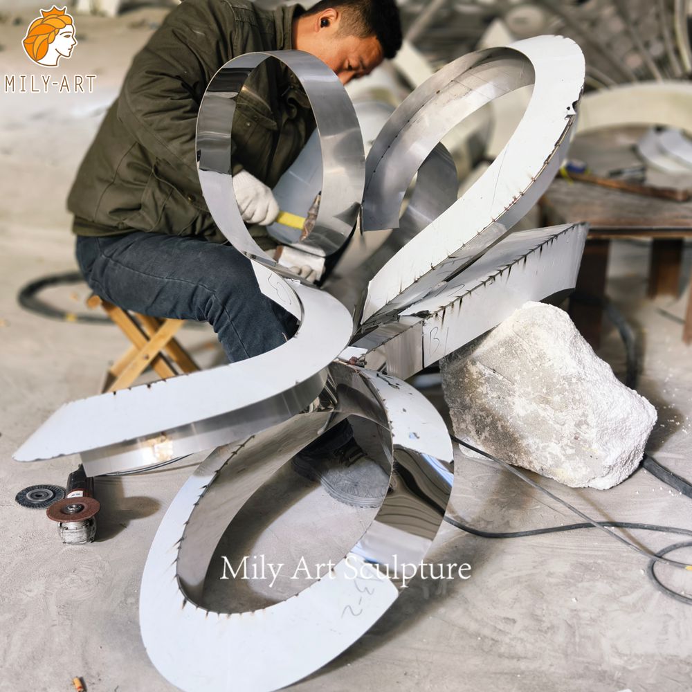metal ring sculpture hand hammering process