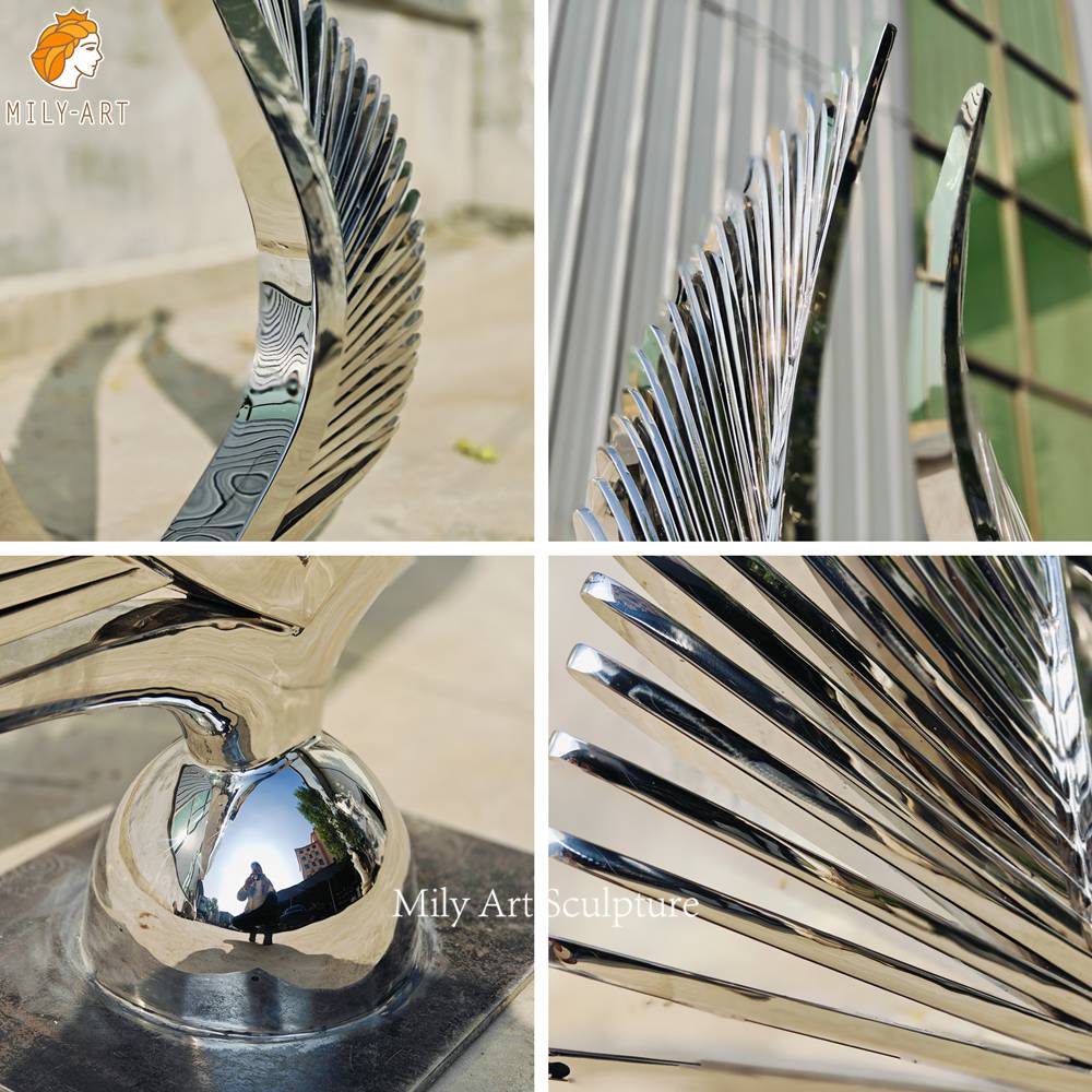 metal wing sculpture feather detail