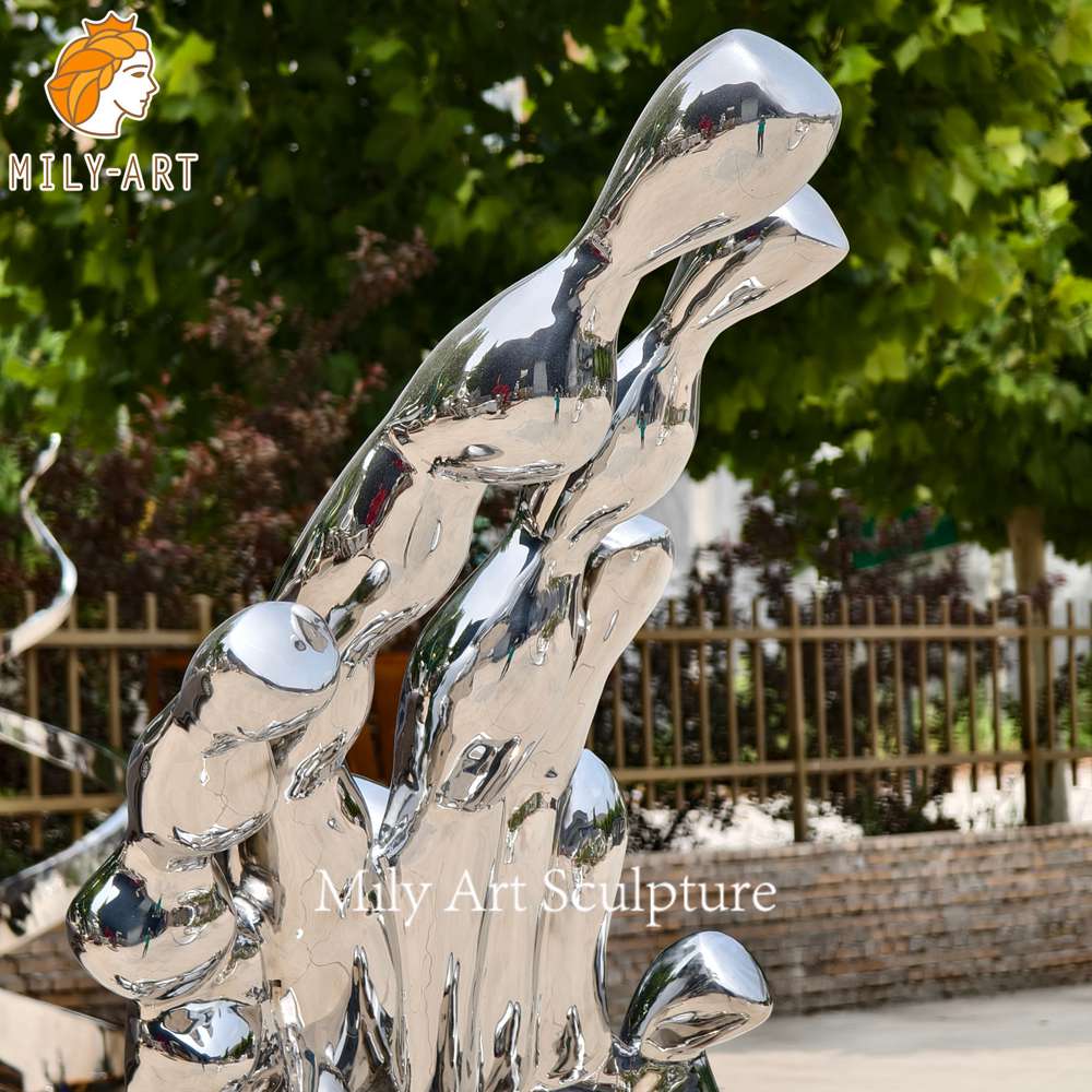 mirror finish metal wave sculpture