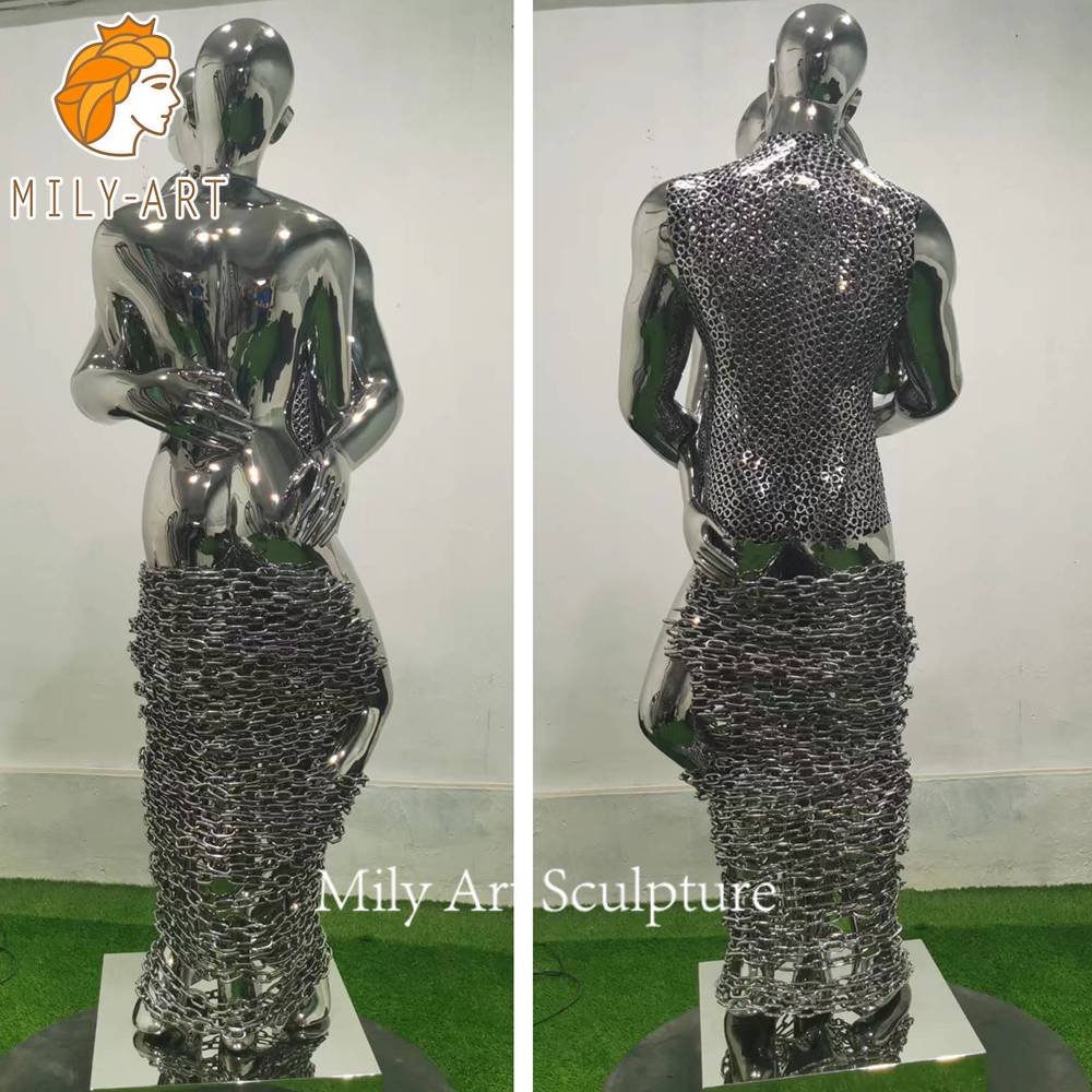 mirror polished embracing couple statue