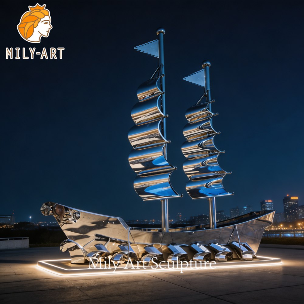 Night View of Metal Sailboat Sculpture