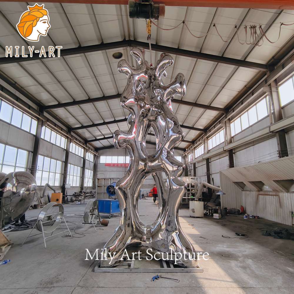 giant stainless steel talking heads sculpture workshop