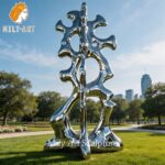 large stainless steel talking heads sculpture