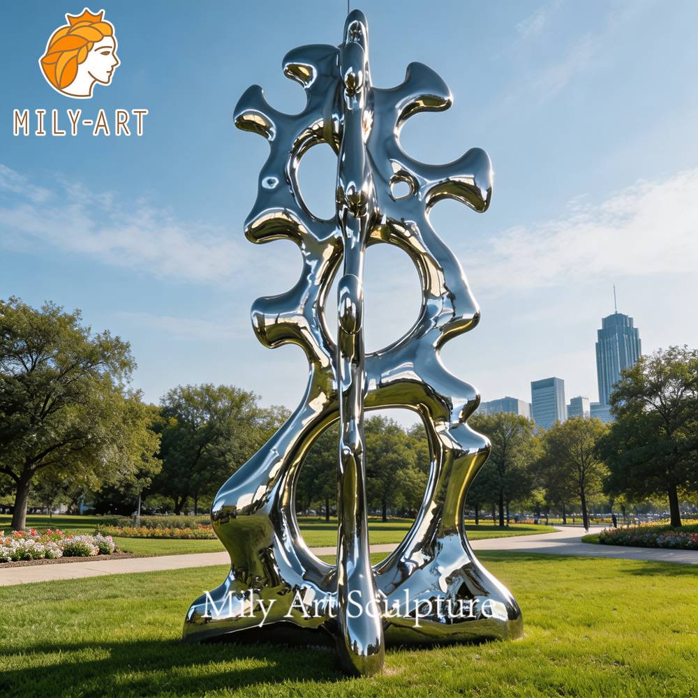large stainless steel talking heads sculpture