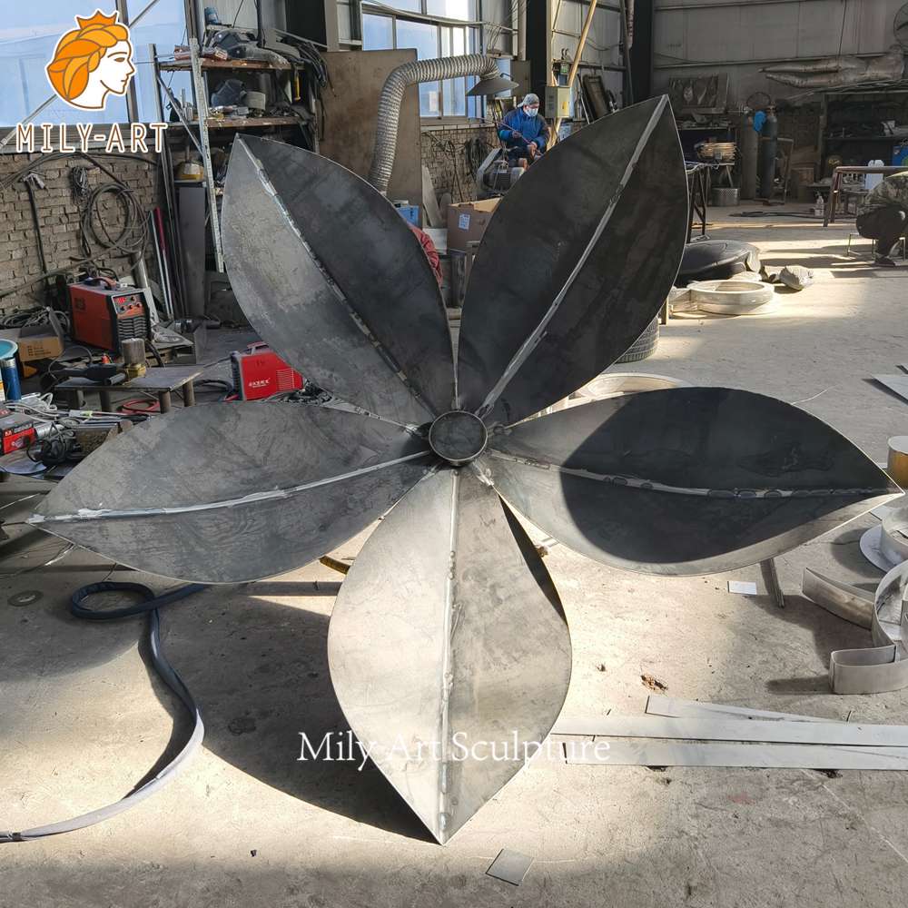 raw corten steel flower sculpture