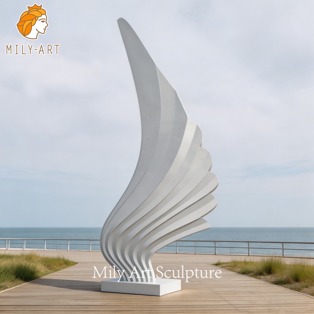 stainless steel abstract wing sculpture