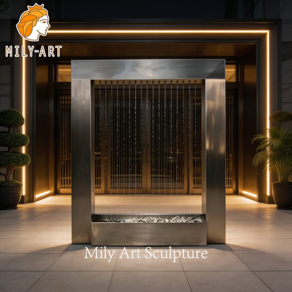 stainless steel rectangular fountain at night
