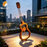 corten steel guitar sculpture