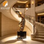 gold metal sculpture staircase