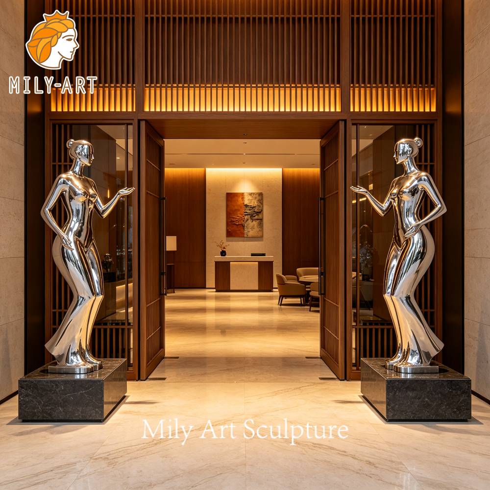 metal figure sculpture pair lobby