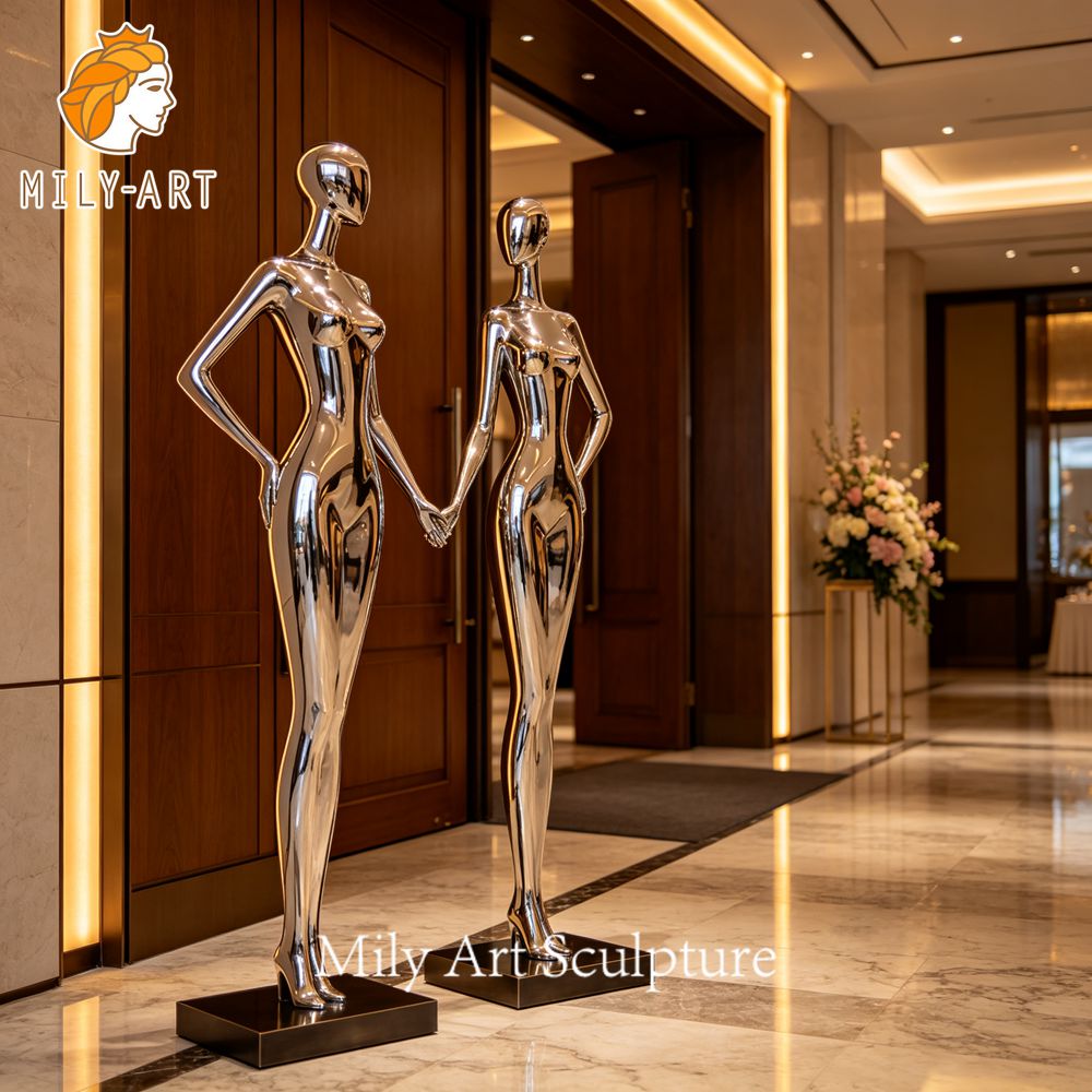 mirror polished figurative pair hotel