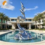 mirror polished metal dolphin sculpture