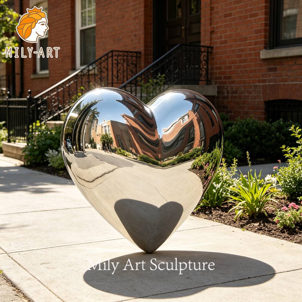mirror polished metal heart sculpture