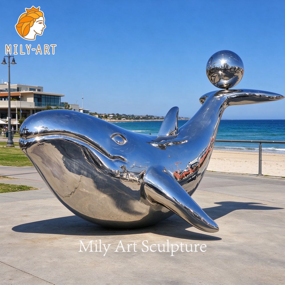 mirror polished whale sculpture