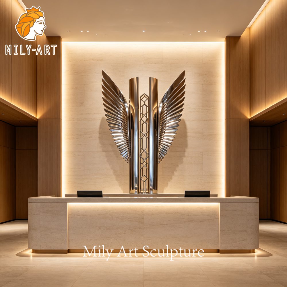 mirror polished wing sculpture reception backdrop