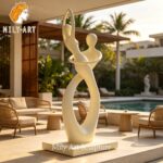 modern dancing couple sculpture