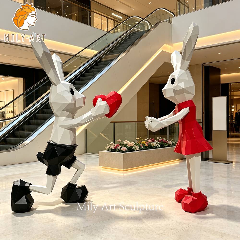 modern painted bunny couple statue