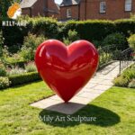 red painted metal heart sculpture