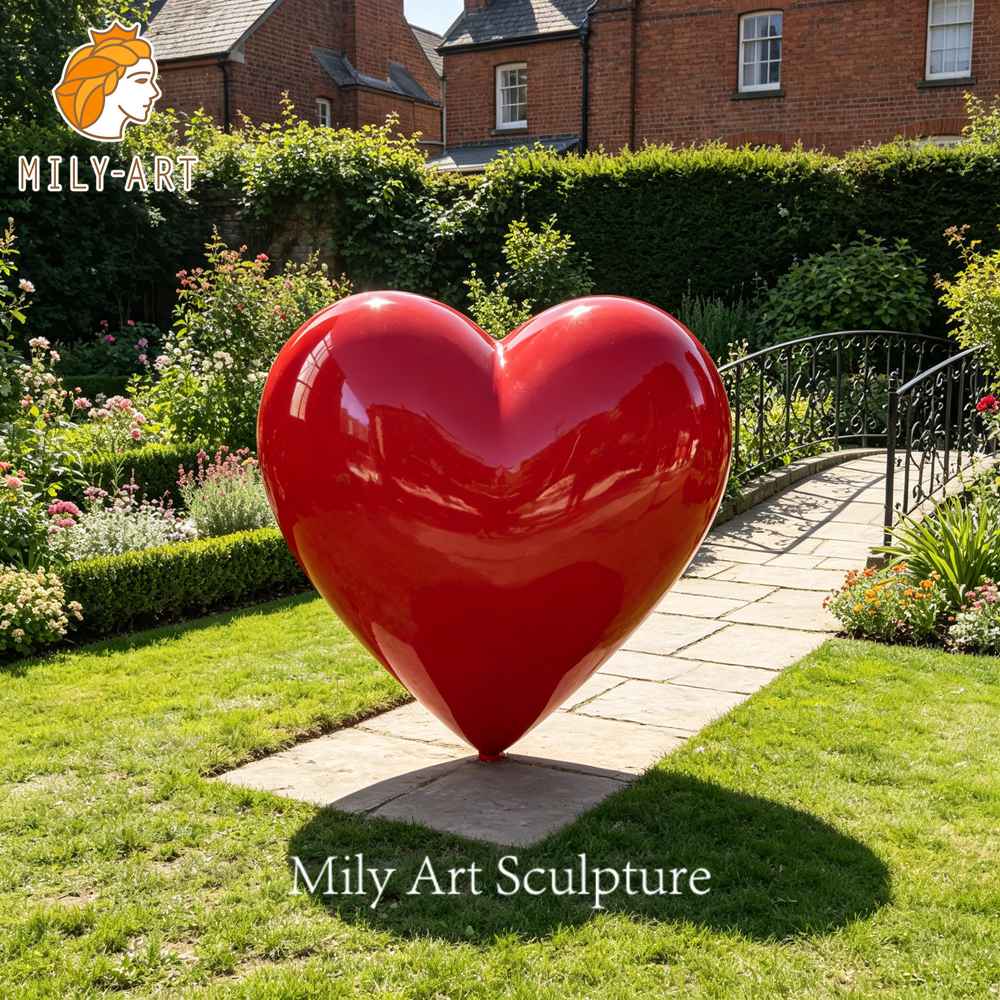 red painted metal heart sculpture