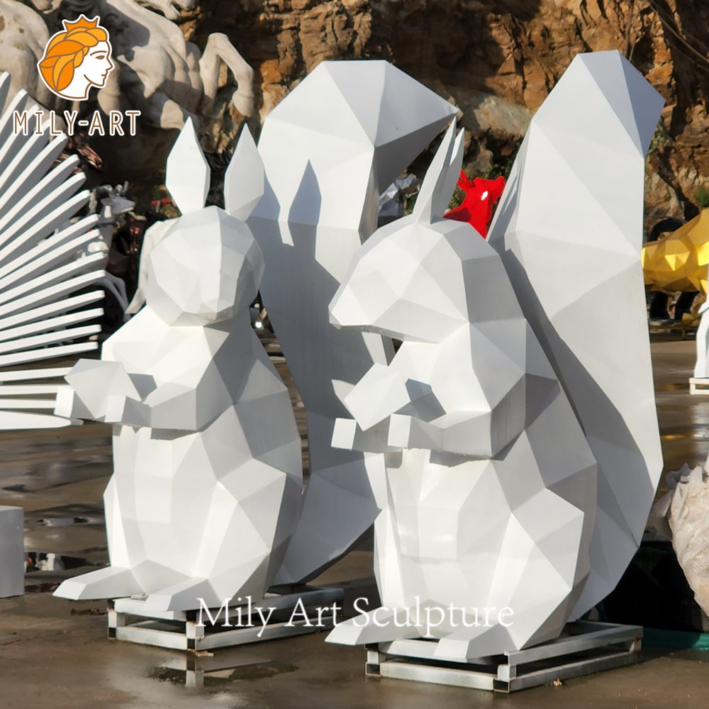 stainless steel faceted squirrel pair sculpture