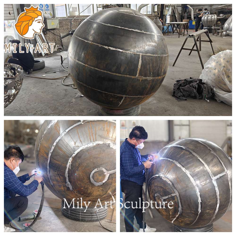 corten steel sphere sculpture welding process