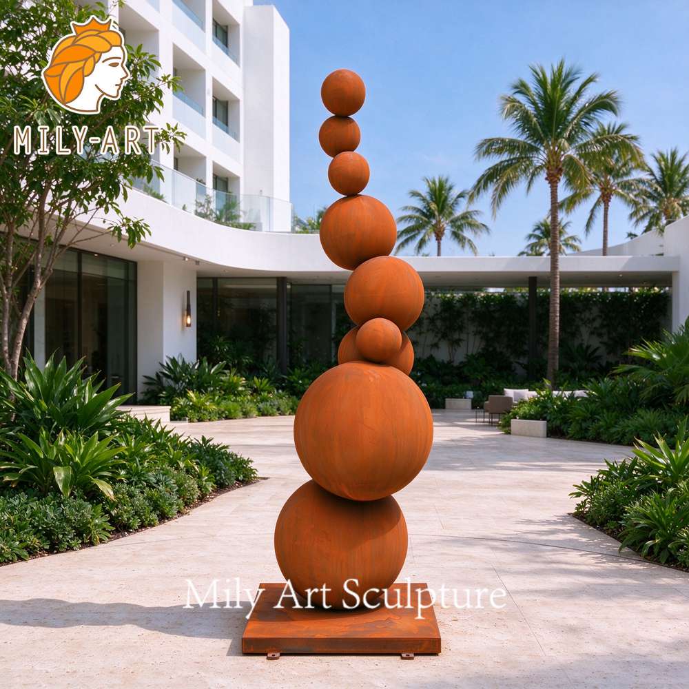 large corten steel ball sculpture
