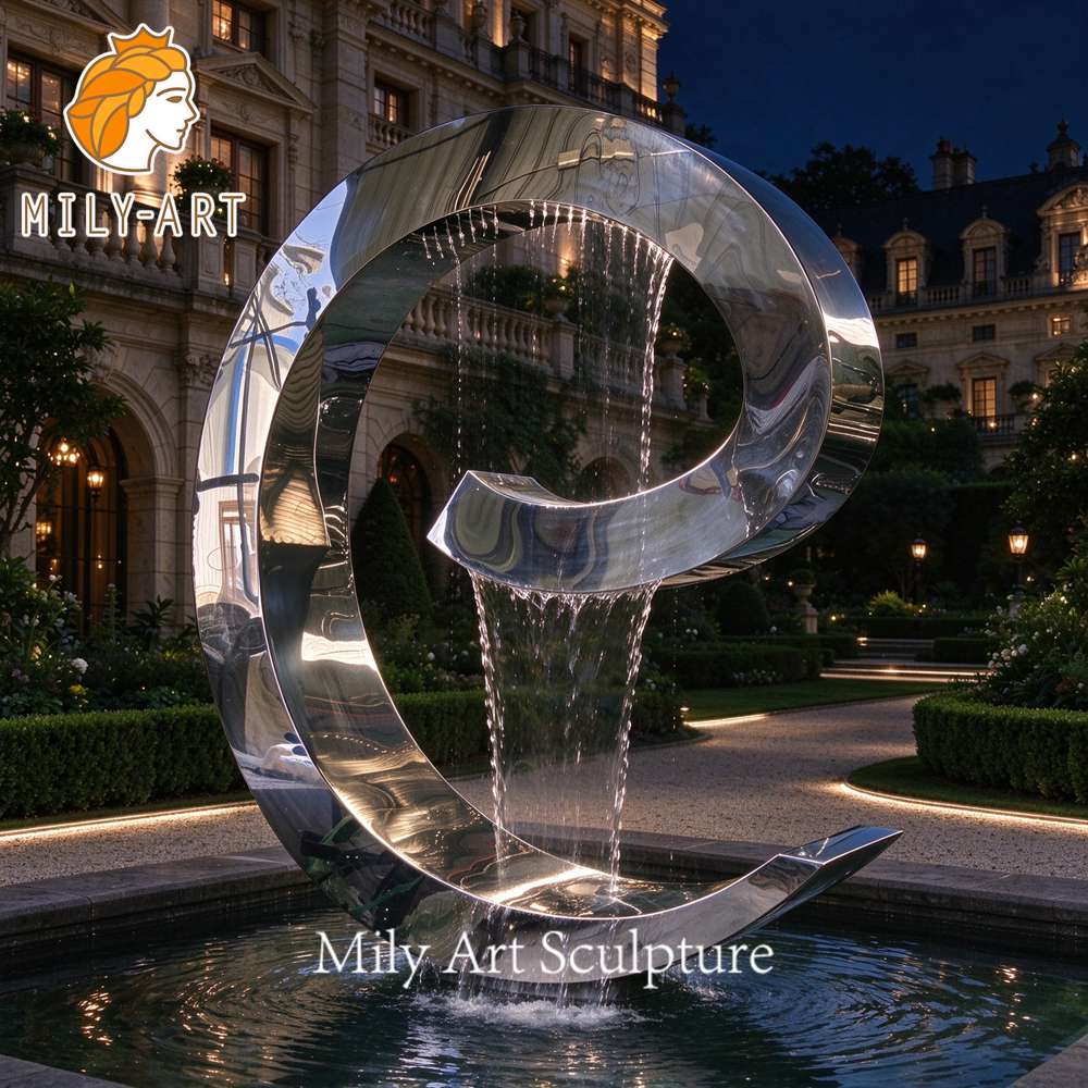 metal curved water fountain night lighting