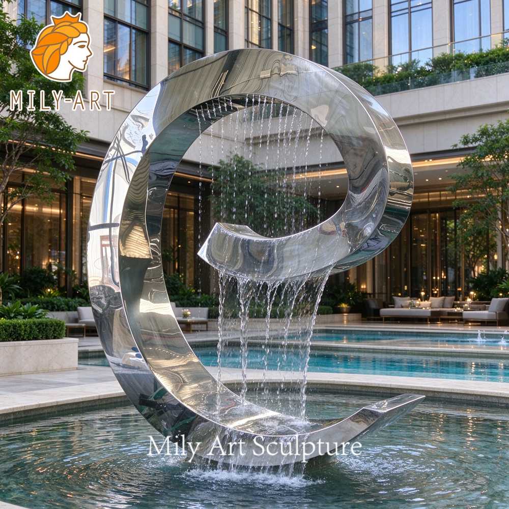 mirror polished curved stainless steel fountain